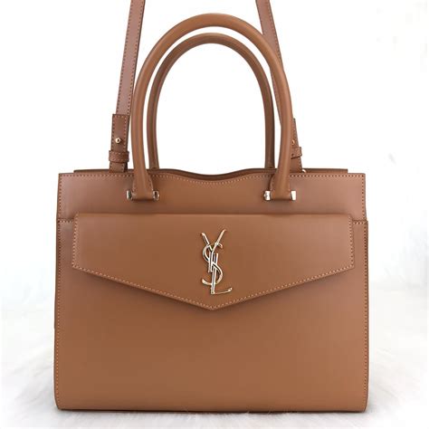 ysl uptown medium tote review|YSL UPTOWN POUCH 1 YEAR REVIEW // What Fits, Pros.